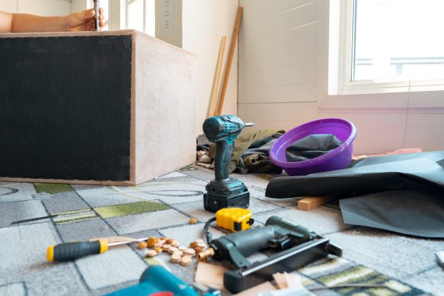 Scattered tools on floor during home post construction cleanup project
